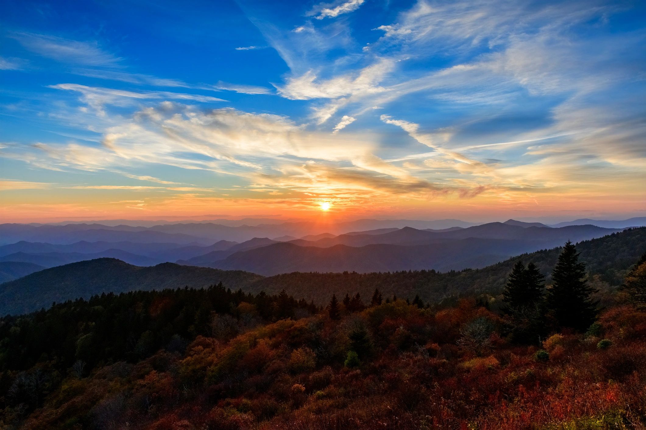Mountain landscape representing club leadership